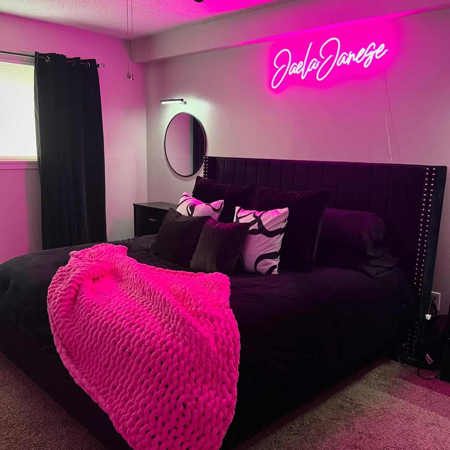 12. Modern Black Bedroom with Neon Pink Lighting Feature - black and pink bedroom ideas