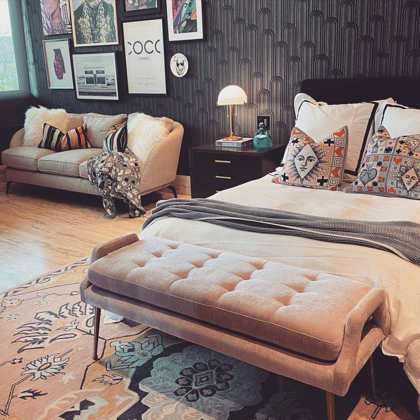 22. Eclectic Black Accent Bedroom with Subtle Pink Details - black and pink bedroom ideas