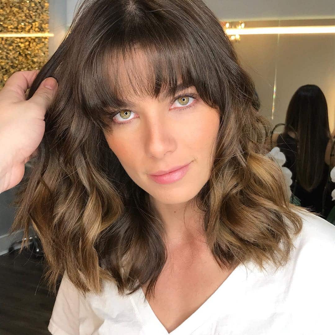 1. Soft Textured Lob with Wispy Fringe in Warm Brunette - Messy Fringe Haircut For Women