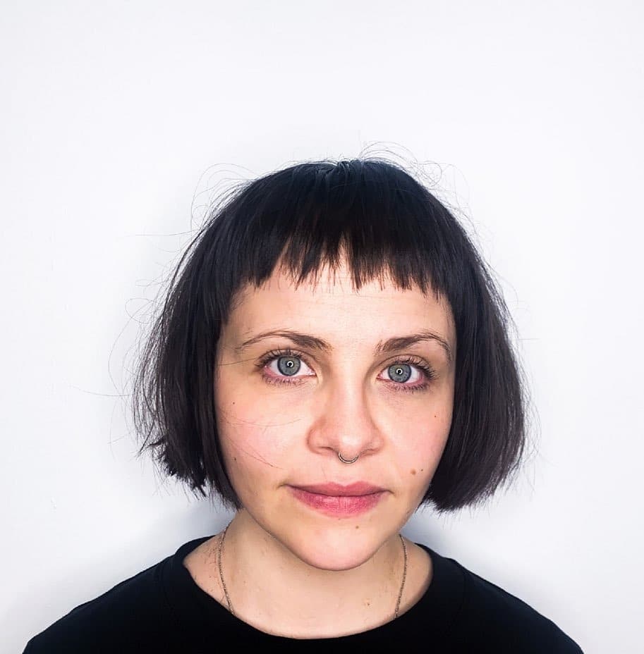 5. Blunt Mini Bob with Baby Fringe in Deep Espresso - Messy Fringe Haircut For Women