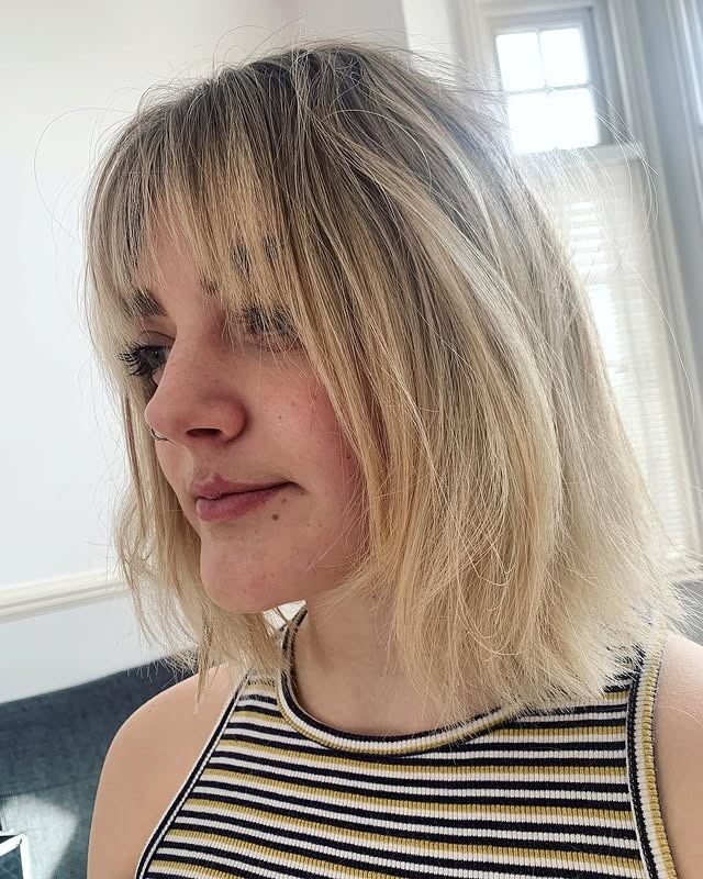 14. Blunt Textured Lob with Wispy Fringe in Soft Platinum Blonde - Messy Fringe Haircut For Women