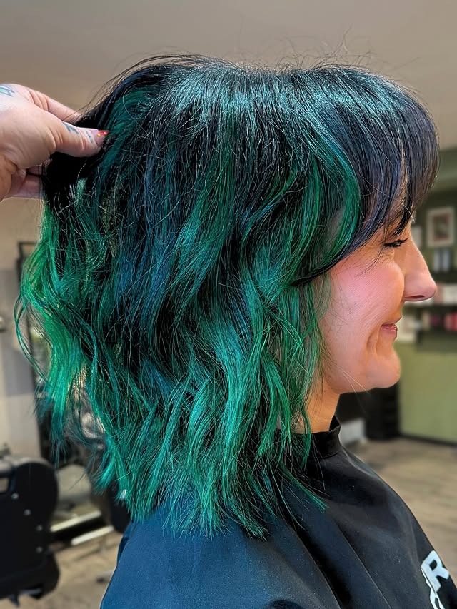 18. Tousled Medium Shag with Curtain Fringe in Deep Emerald Green - Messy Fringe Haircut For Women