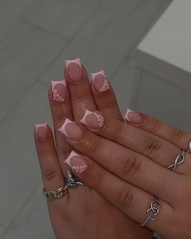 6. Pink Reverse French Floral Tips - spring nail ideas