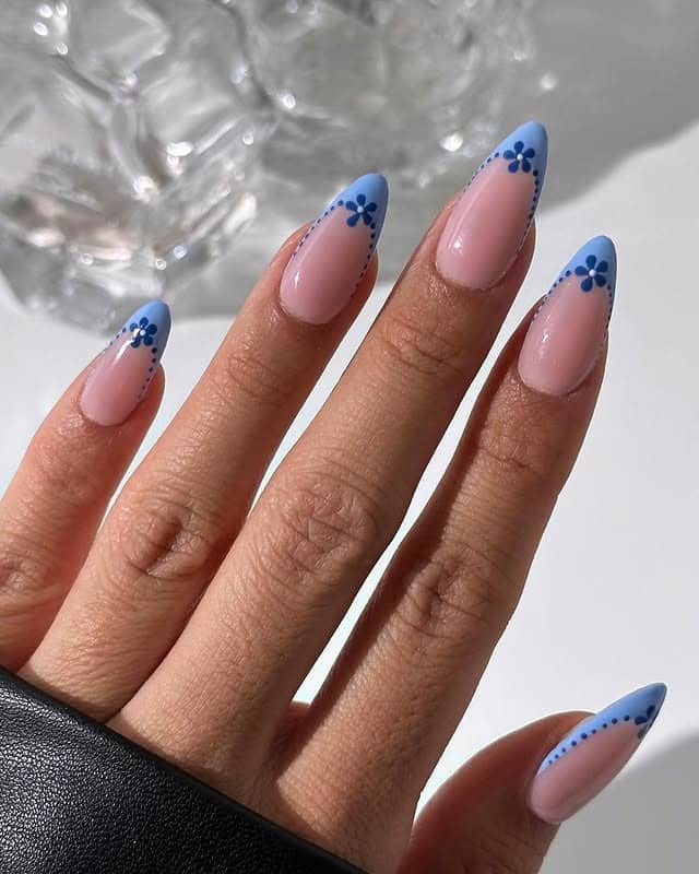 11. Blue Floral French Tip Almond Nails - spring nail ideas