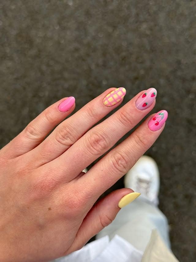 16. Pink and Yellow Mix-and-Match Spring Nails - spring nail ideas