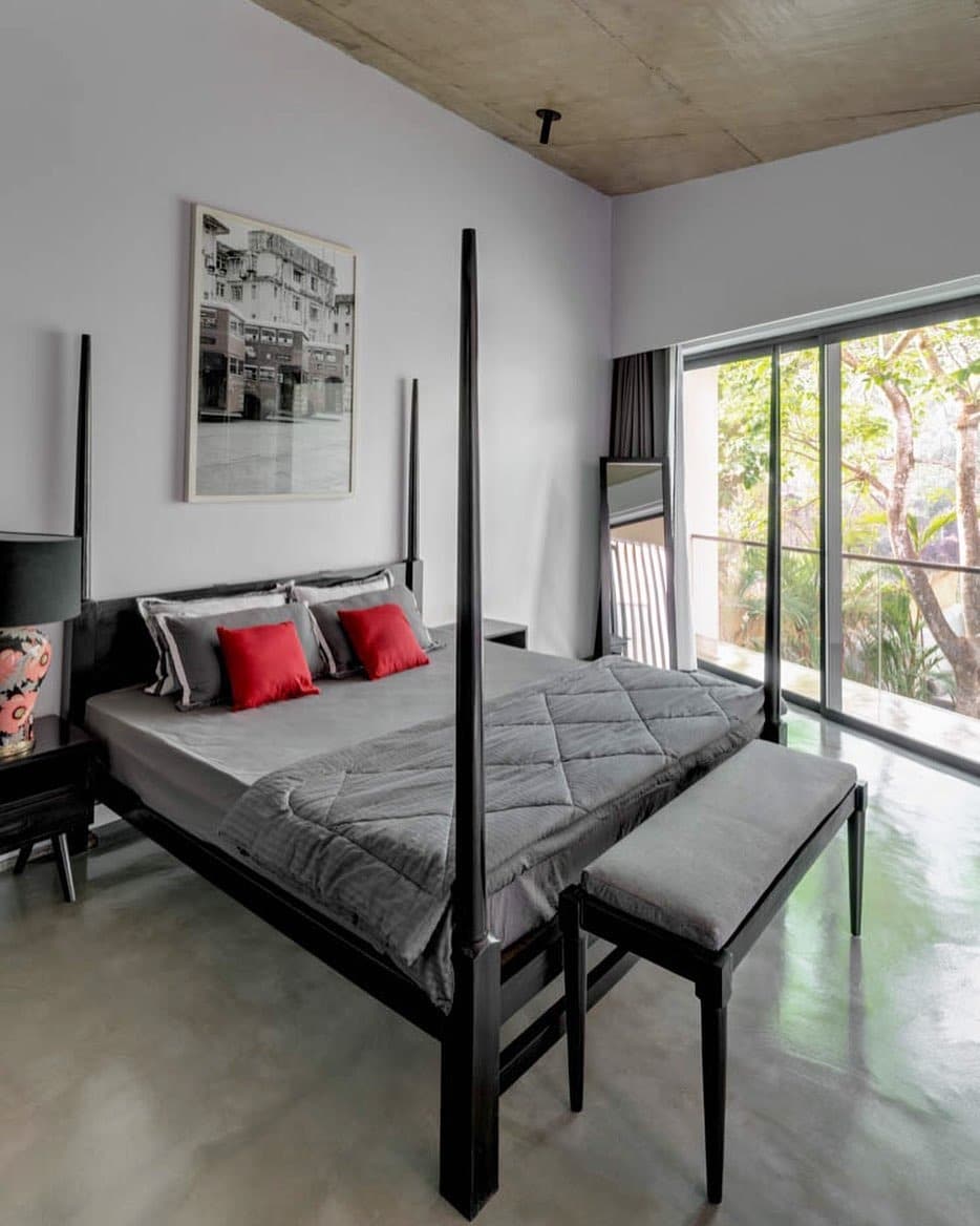 9. Artistic Red and Black Feature Wall Bedroom - red, black and white bedroom ideas