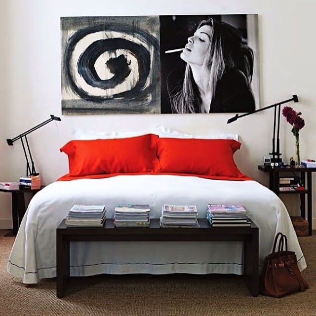 13. Modern Art-Led Bedroom with Red Accent Pillows - red, black and white bedroom ideas