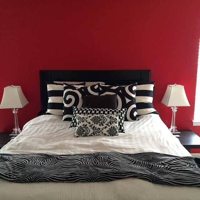 14. Bold Red Feature Wall with Black and White Pattern Mixing - red, black and white bedroom ideas