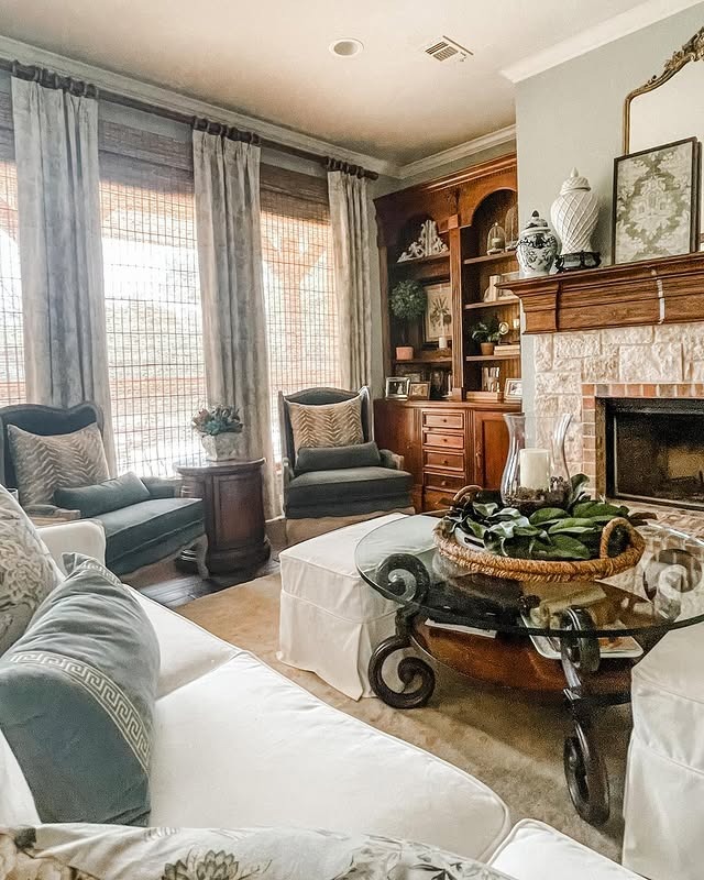 6. Elegant Traditional with Deep Wood and Soft Blue-Green - french country living room ideas