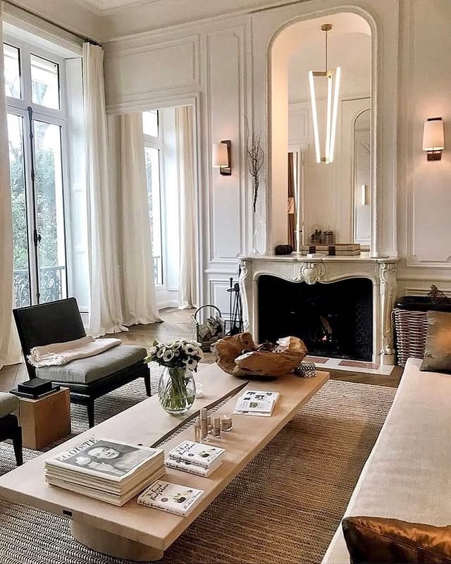 15. Refined Parisian-Inspired Space with Beige and Black Accents - french country living room ideas