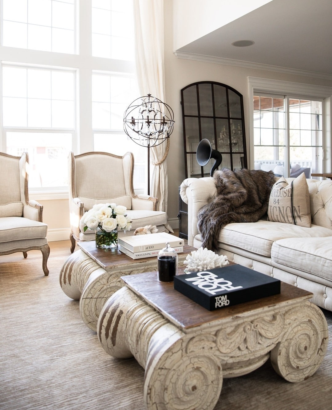 18. Collected French Country Style with Cream and Natural Wood Layers - french country living room ideas