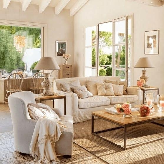 21. Sunlit French Country Living with Cream and Warm Beige - french country living room ideas