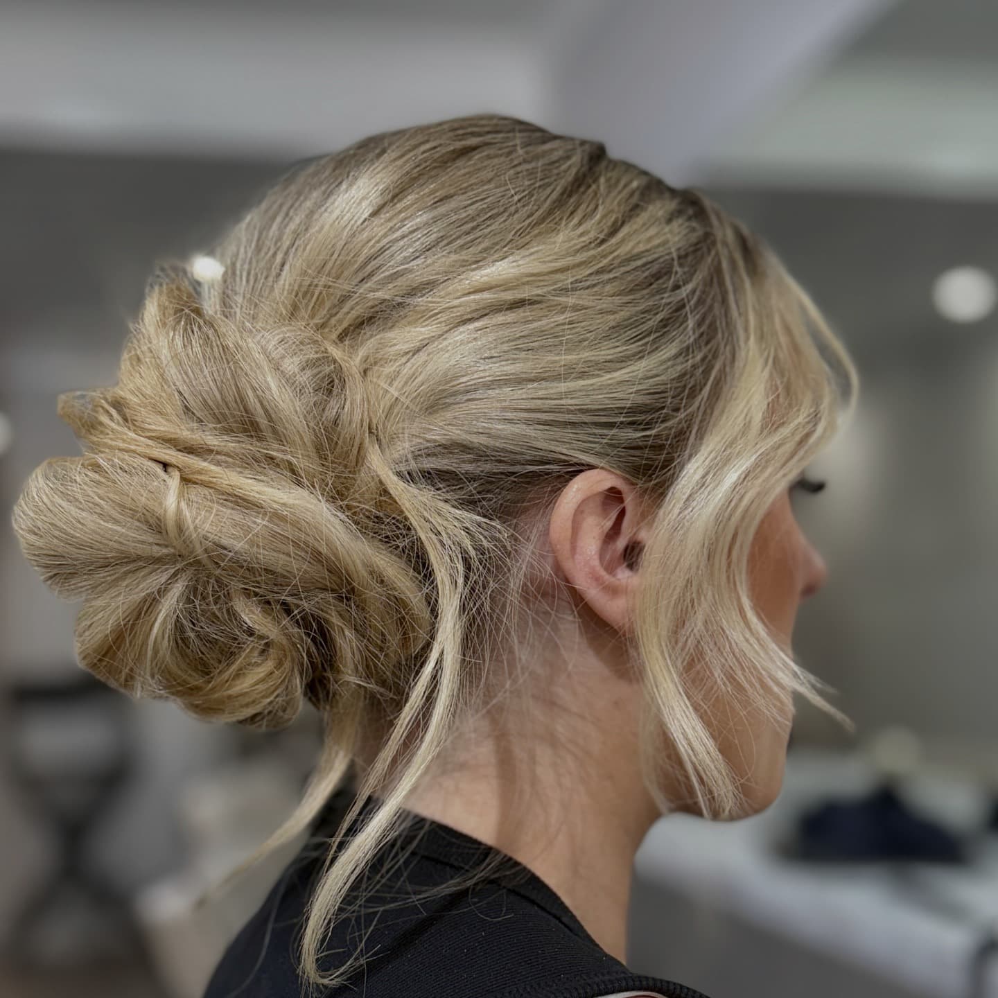 1. Soft Blonde Textured Low Messy Bun - Messy Bun Hairstyles
