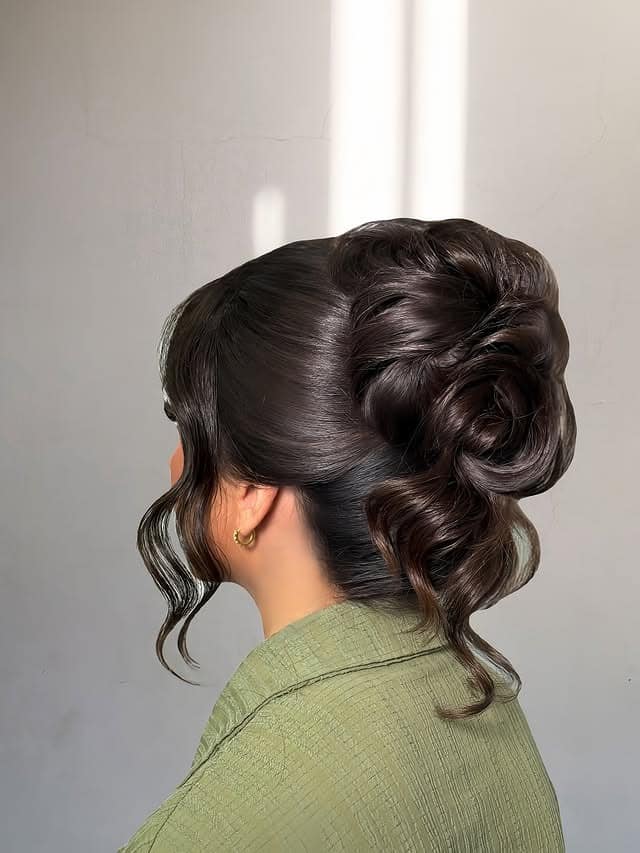 17. Dark Espresso Curled Messy Bun with Face-Framing Pieces - Messy Bun Hairstyles