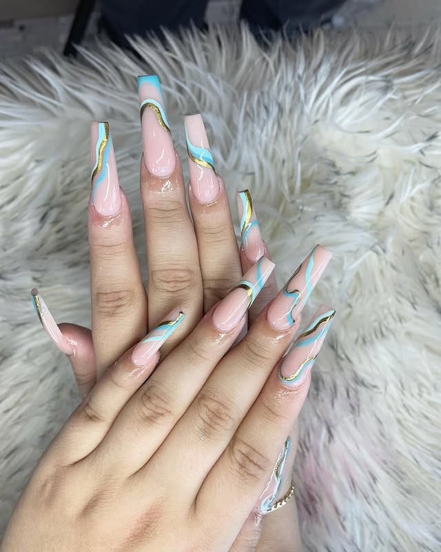 5. Pastel Blue and Gold Wave Nails - first day of school nail ideas