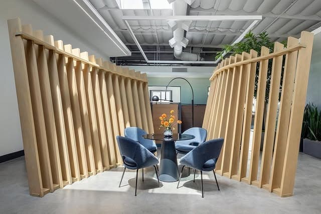 10. Contemporary Office Nook With Sculptural Wood Divider - creative office ideas