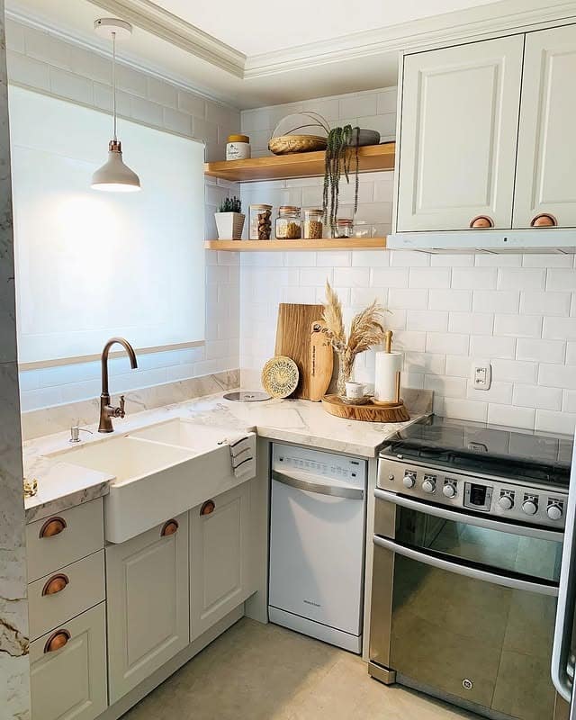 3. Soft Sage Corner Kitchen With Floating Wood Shelves - corner kitchen ideas