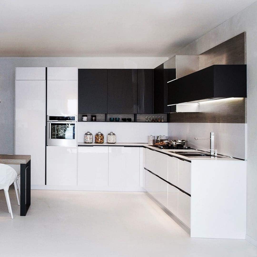 4. Black and White Minimalist Corner Kitchen Design - corner kitchen ideas