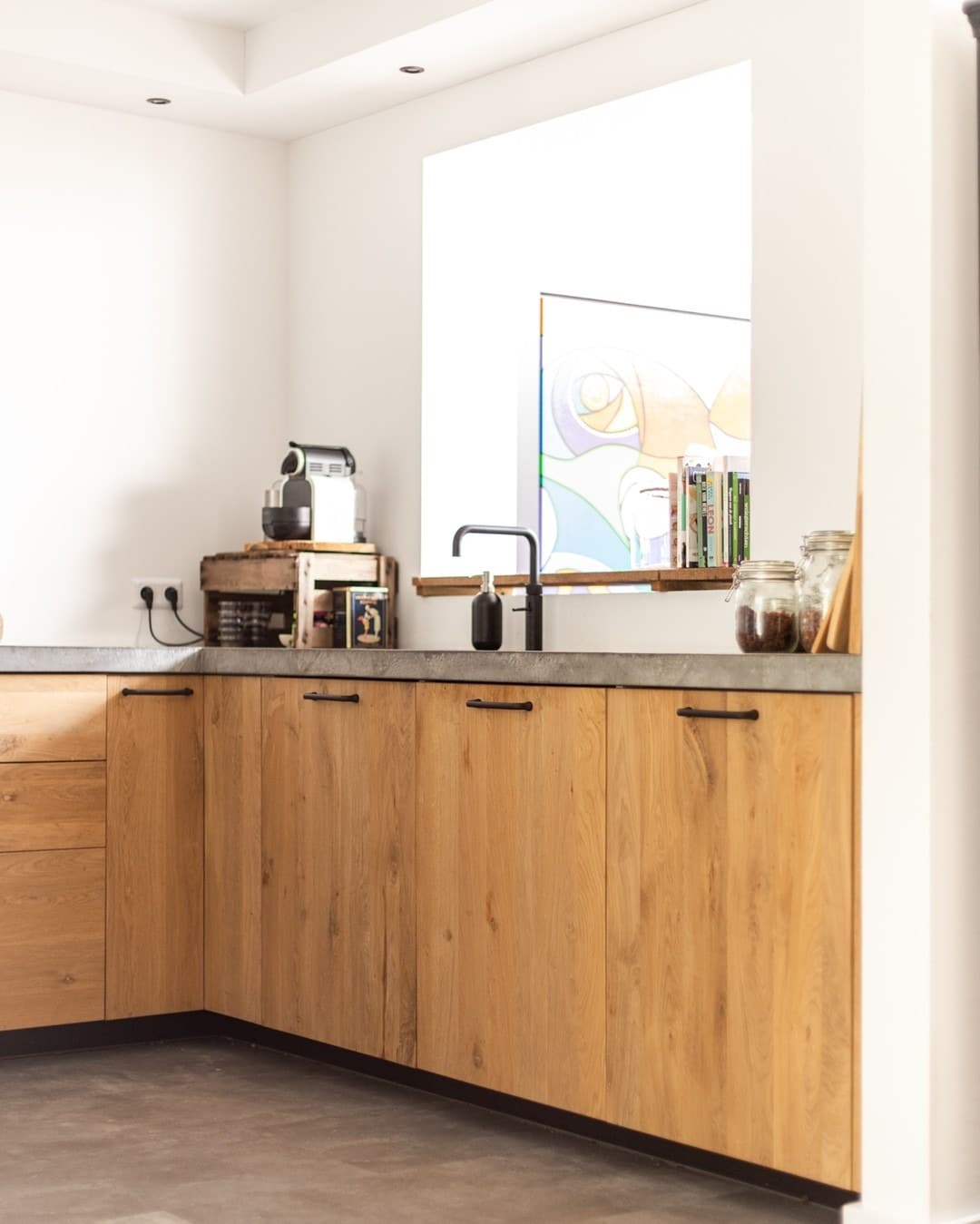 16. Warm Wood Corner Kitchen With Concrete-Style Counters - corner kitchen ideas
