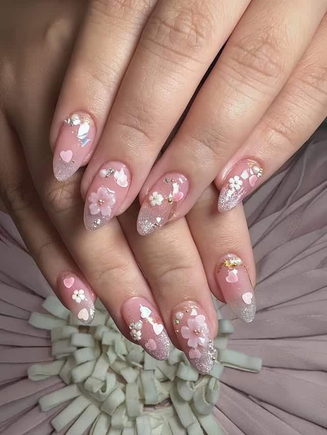 9. Glitter Pink Blossom Almond Nails - flower nail ideas