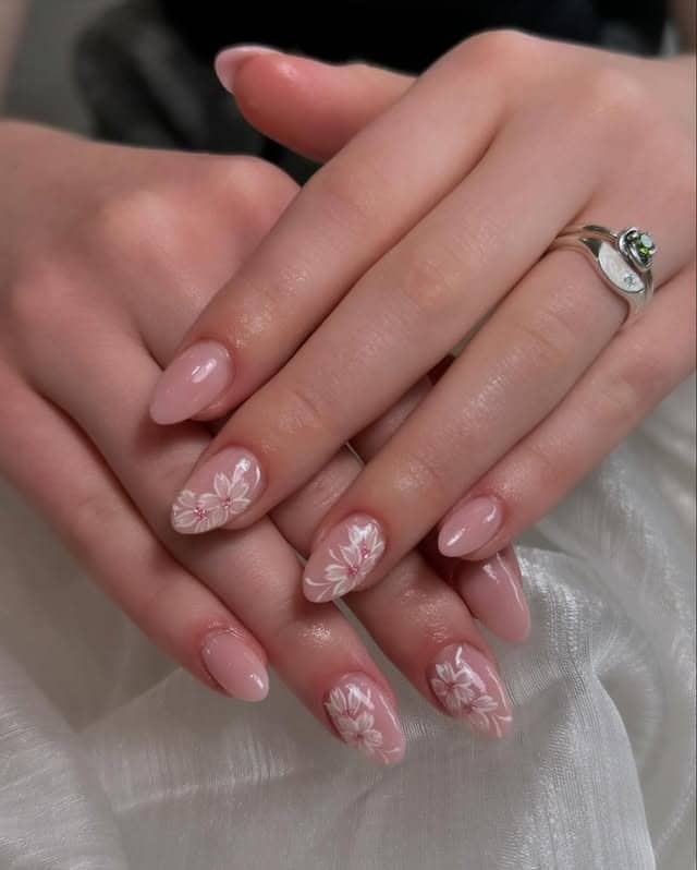 10. Sheer Pink Floral Almond Nails - flower nail ideas