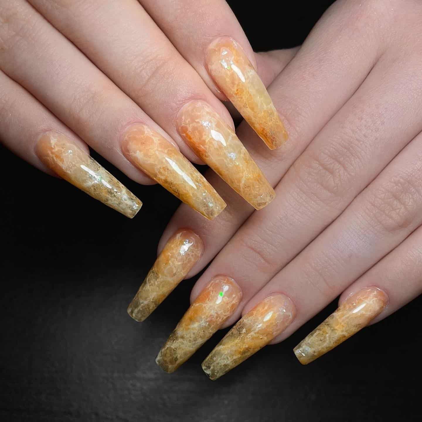 1. Amber Marble Yellow Coffin Nails - yellow coffin nail ideas