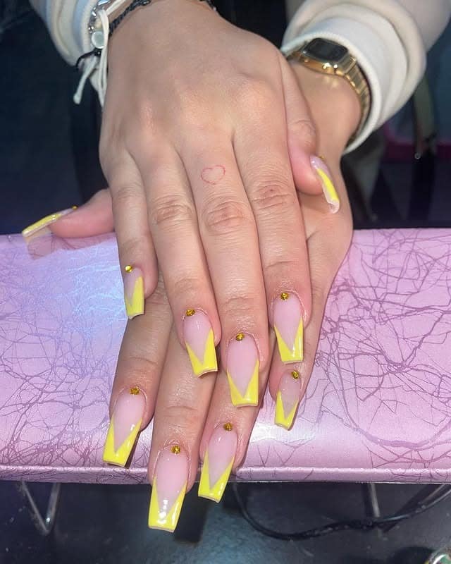 6. Yellow V French Tip Coffin Nails with Rhinestones - yellow coffin nail ideas