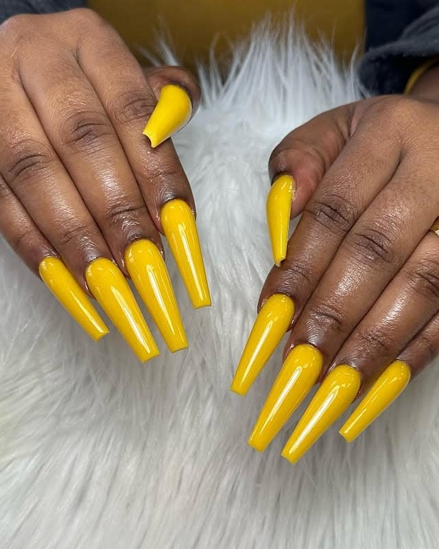 14. Bright Sunflower Yellow Long Coffin Nails - yellow coffin nail ideas