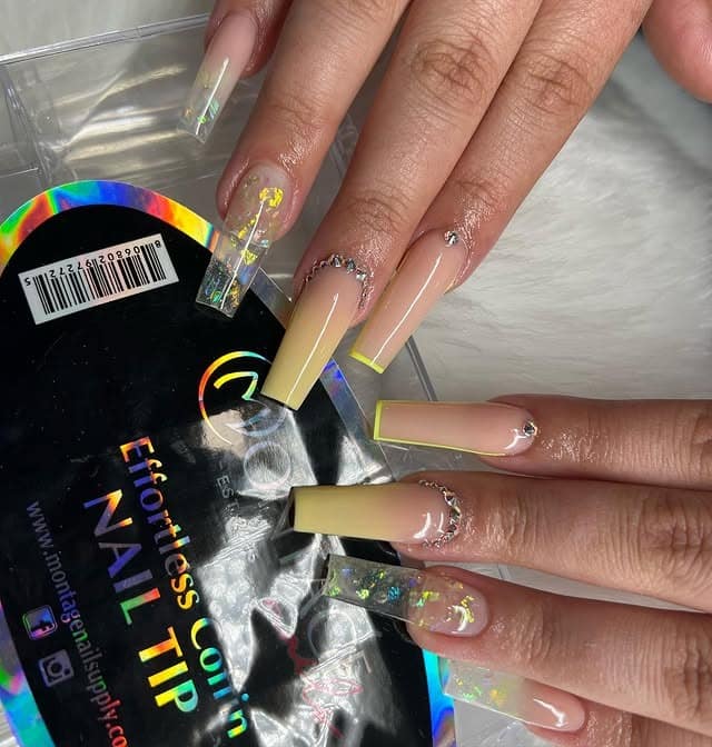 19. Nude Yellow Ombre Coffin Nails with Glitter Details - yellow coffin nail ideas