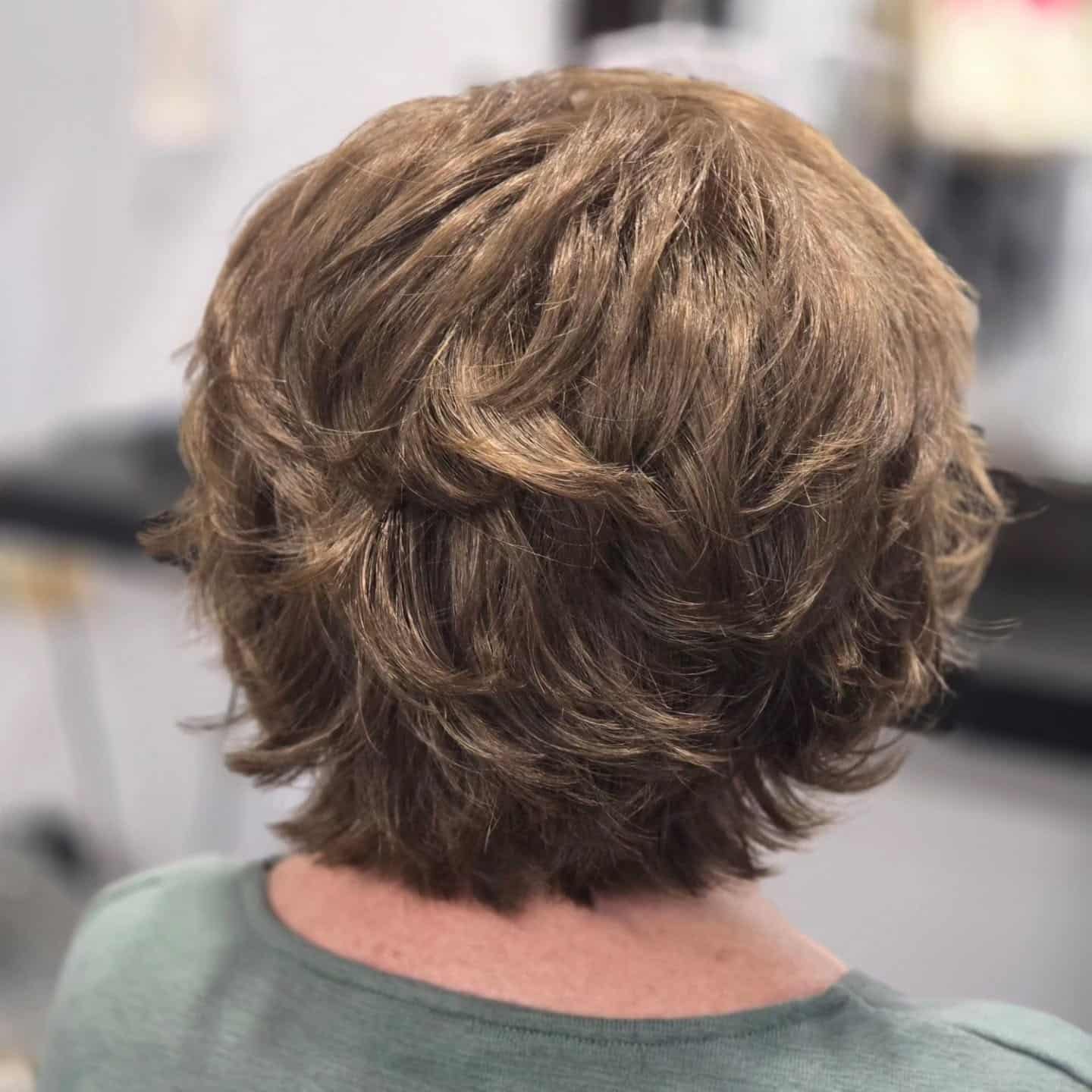 4. Layered Feathered Crop with Soft Chestnut Brown - Short Wispy Haircuts