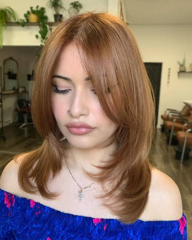 5. Soft Butterfly Layers with Warm Honey Brown - Short Wispy Haircuts