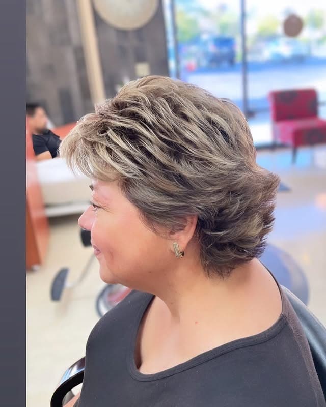 10. Feathered Pixie Bob with Silver Ash Highlights - Short Wispy Haircuts