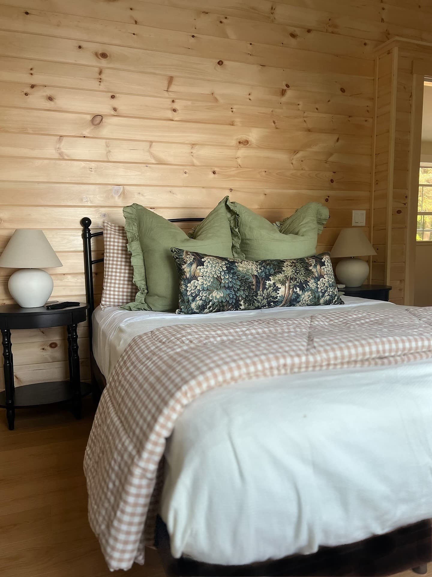 20. Rustic Cabin Bedroom with Soft Green and Gingham Textiles - earthy bedroom ideas
