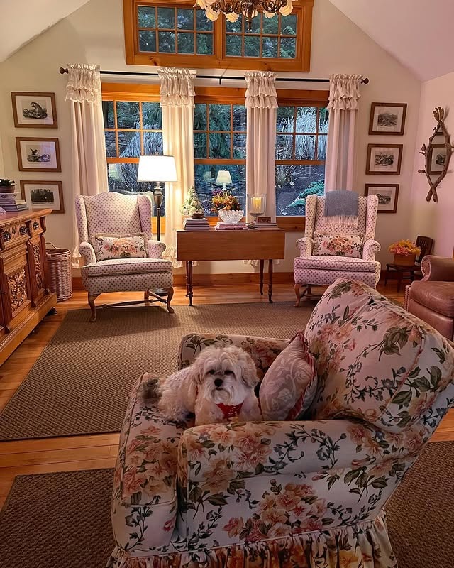 3. Vintage Floral Cottage Living Room in Soft Pink and Wood Tones - cottage living room ideas