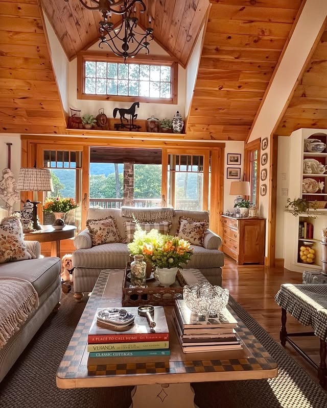5. Warm Wood Cottage Living Room with Cabin-Inspired Charm - cottage living room ideas