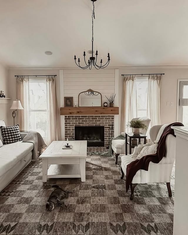 7. Neutral Farmhouse Cottage Living Room with Brick Fireplace - cottage living room ideas