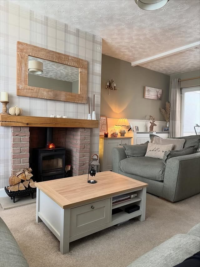 11. Sage Green Cottage Living Room with Plaid Fireplace Wall - cottage living room ideas