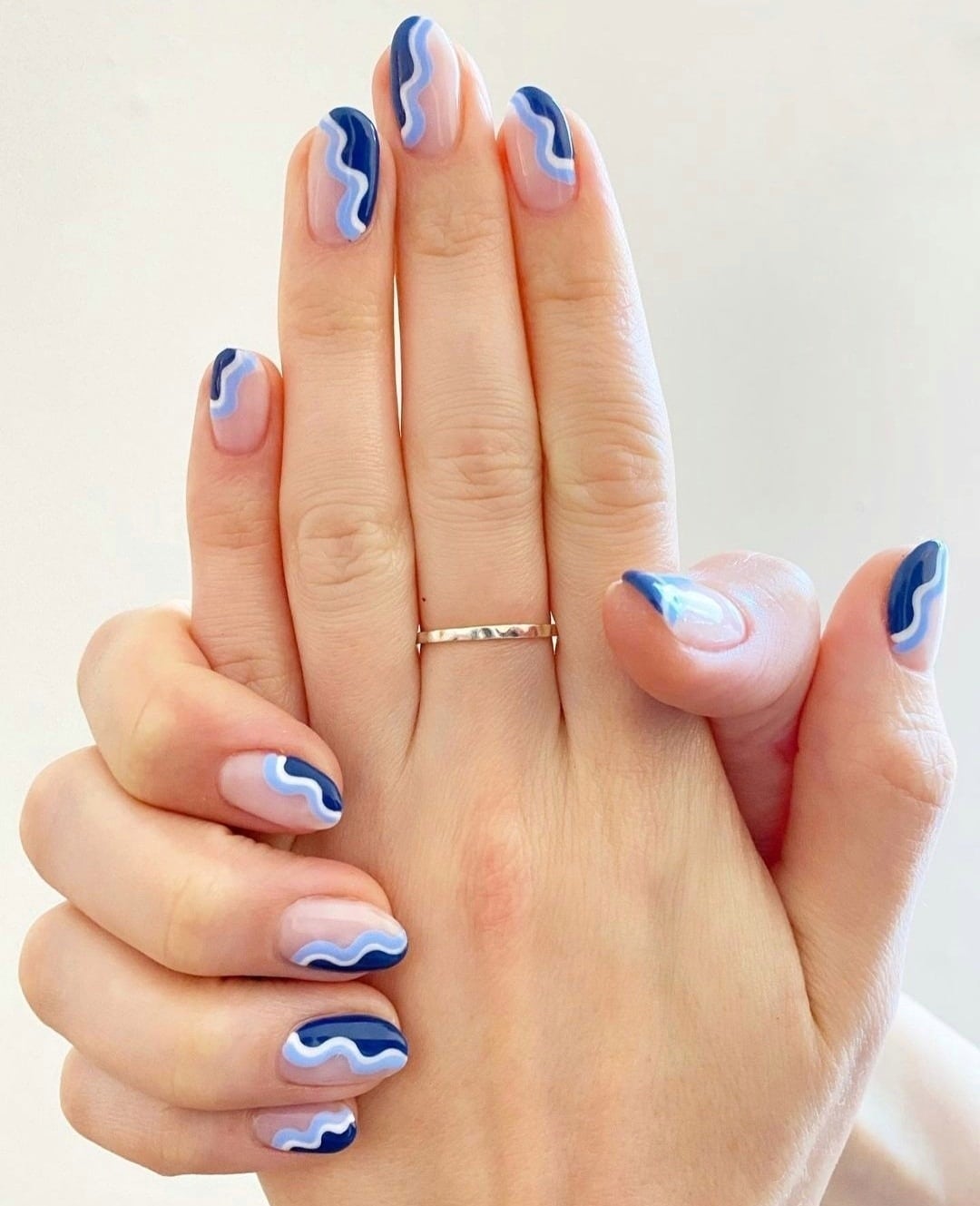 4. Blue Wave Zig Zag Short Nails - zig zag nail ideas