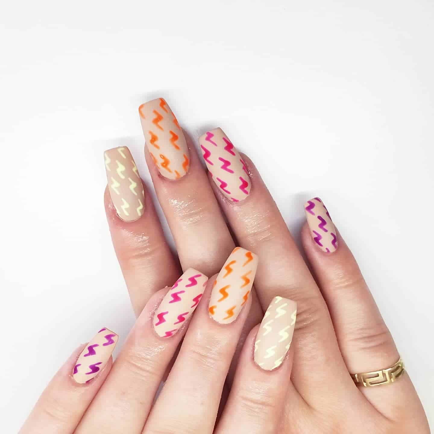 7. Matte Pastel Zig Zag Coffin Nails - zig zag nail ideas