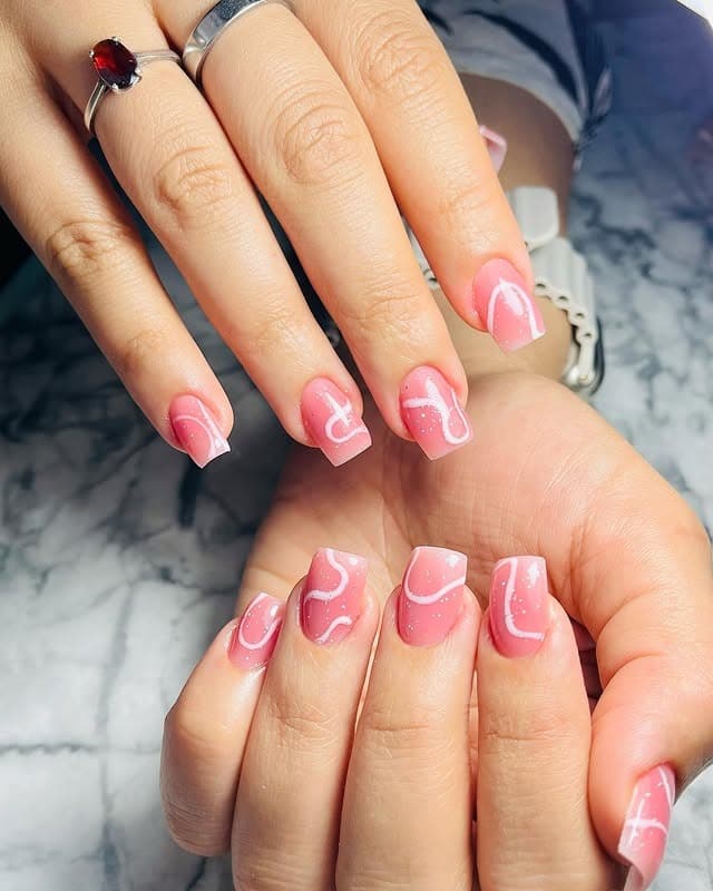 8. Soft Pink Abstract Line Nails - zig zag nail ideas