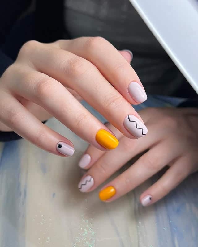 9. Minimal Yellow Zig Zag Accent Nails - zig zag nail ideas