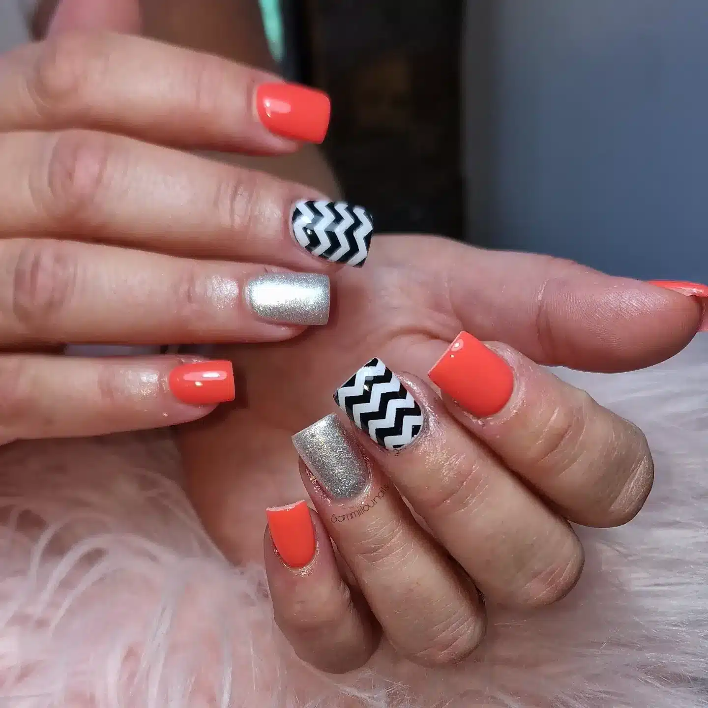 18. Coral Chevron Accent Square Nails - zig zag nail ideas