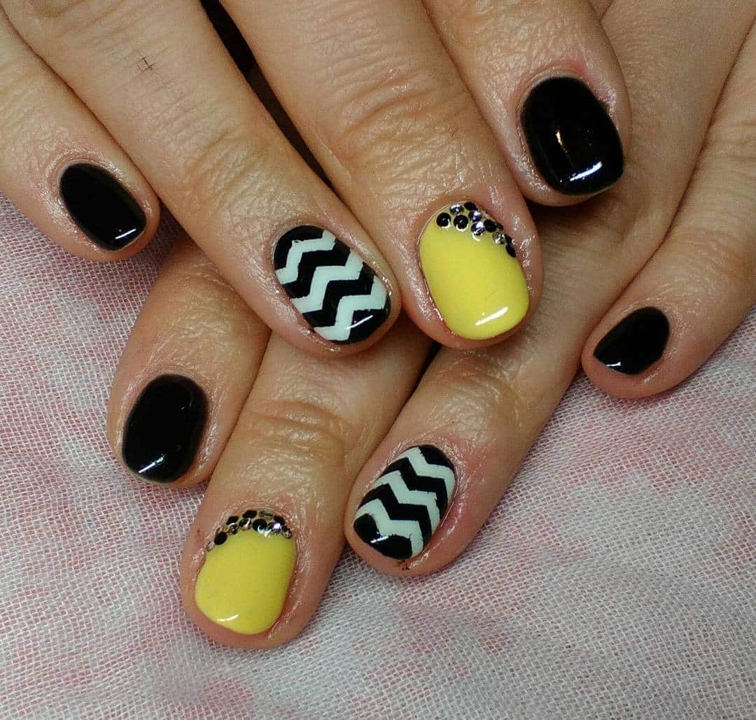 19. Black, White, and Yellow Zig Zag Nails - zig zag nail ideas