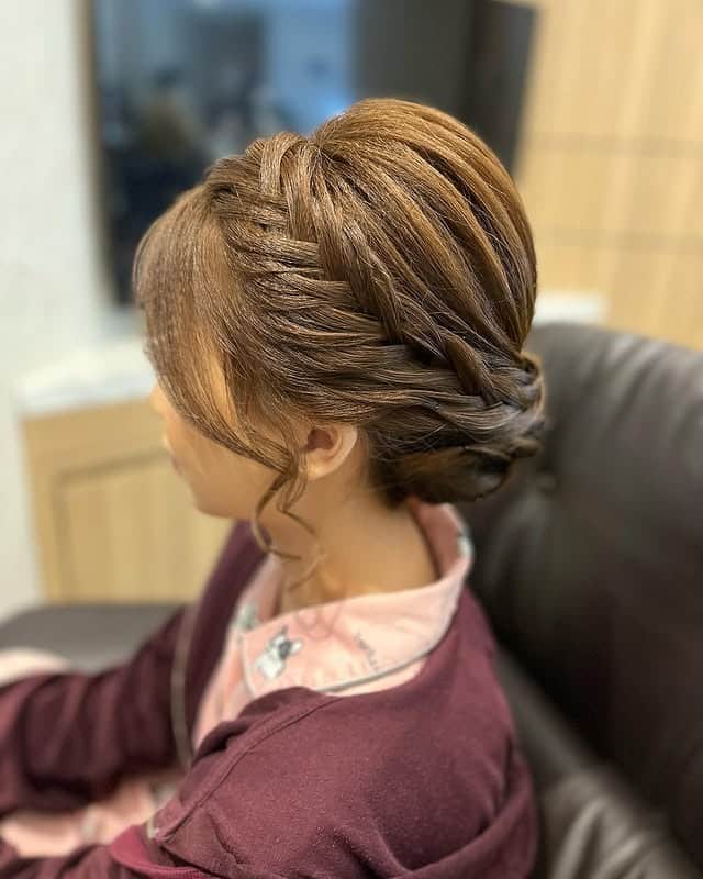 10. Espresso Brown Fishtail Low Bun - Fishtail Braid Hairstyles