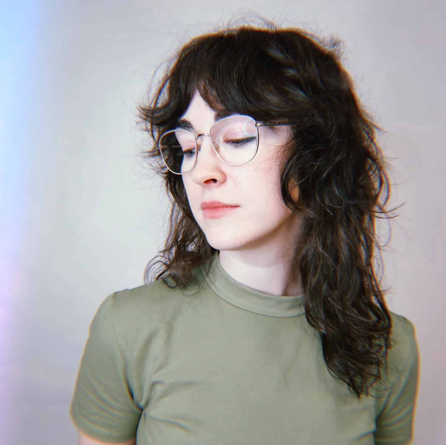 6. Soft Curly Mullet with Deep Brunette Shade - Wispy Bangs For Curly Hair