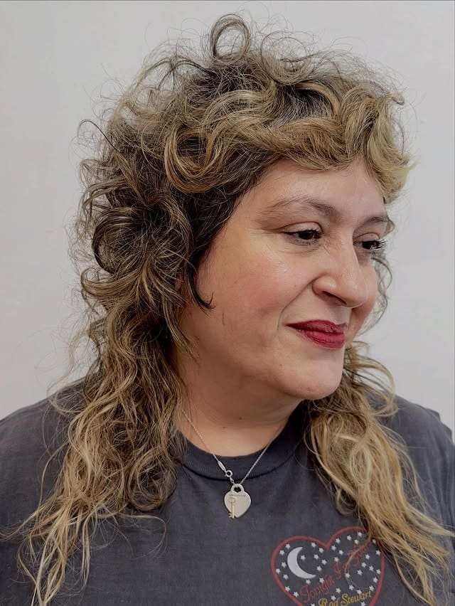 17. Curly Mullet with Golden Blonde Balayage - Wispy Bangs For Curly Hair