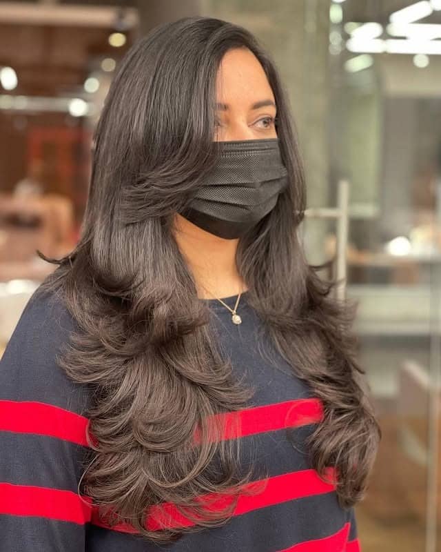 7. Deep Brunette Voluminous Layers - Long Textured Layers