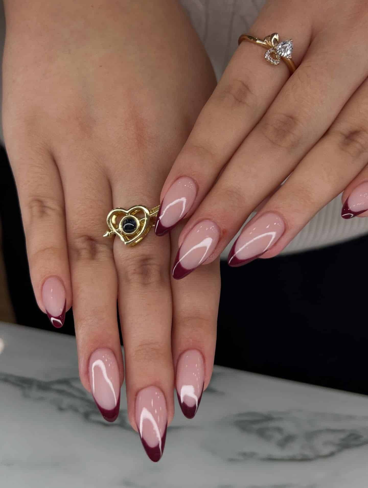 2. Burgundy French Almond Nails - french nail ideas
