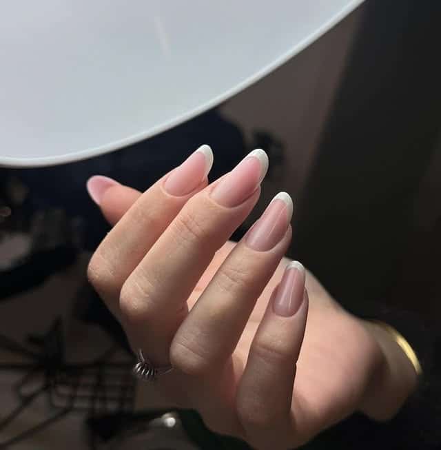 13. Natural Pink French Oval Nails - french nail ideas
