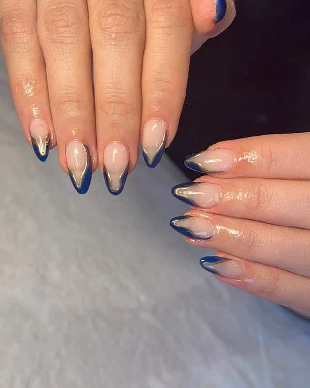 15. Navy Blue Outline French Almond Nails - navy and gold nail ideas